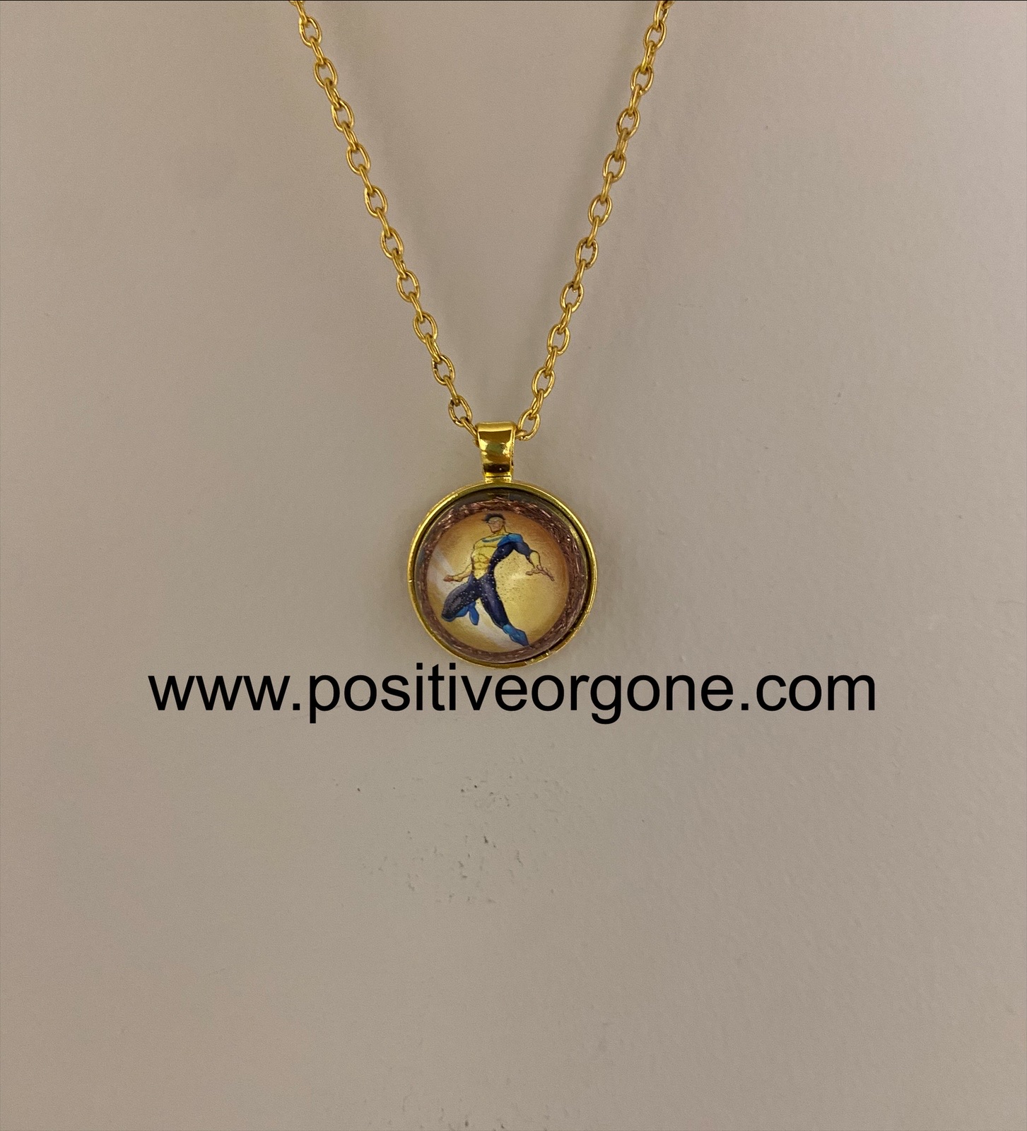 Founder-crafted orgone pendant in workshop setting